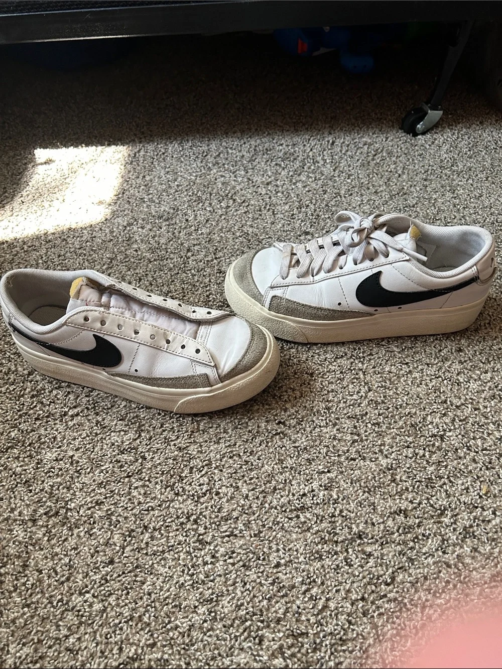 Nike White Sneakers with Black Swoosh and Yellow Tongue